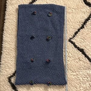 Hand knit scarf with floral accents